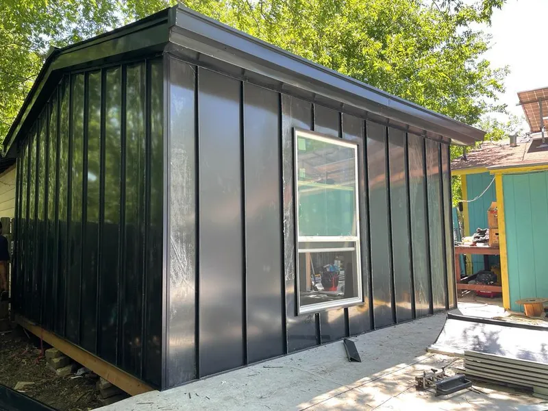 Black standing seam metal wall panels for Metal Roof Installation in Kill Devil Hills