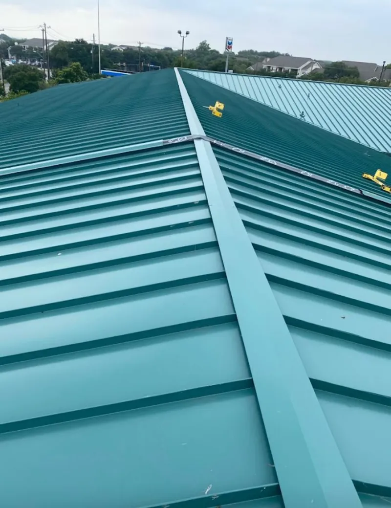 Green commercial metal roof ridge and valley for Metal Roof Repair in Kill Devil Hills