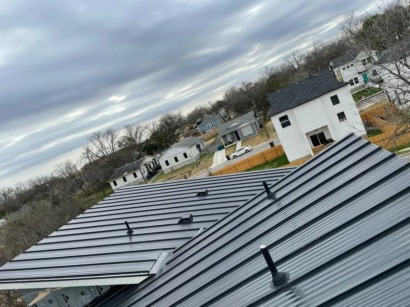 Standing seam metal roof panels with vents for Skylight Repair in Kill Devil Hills